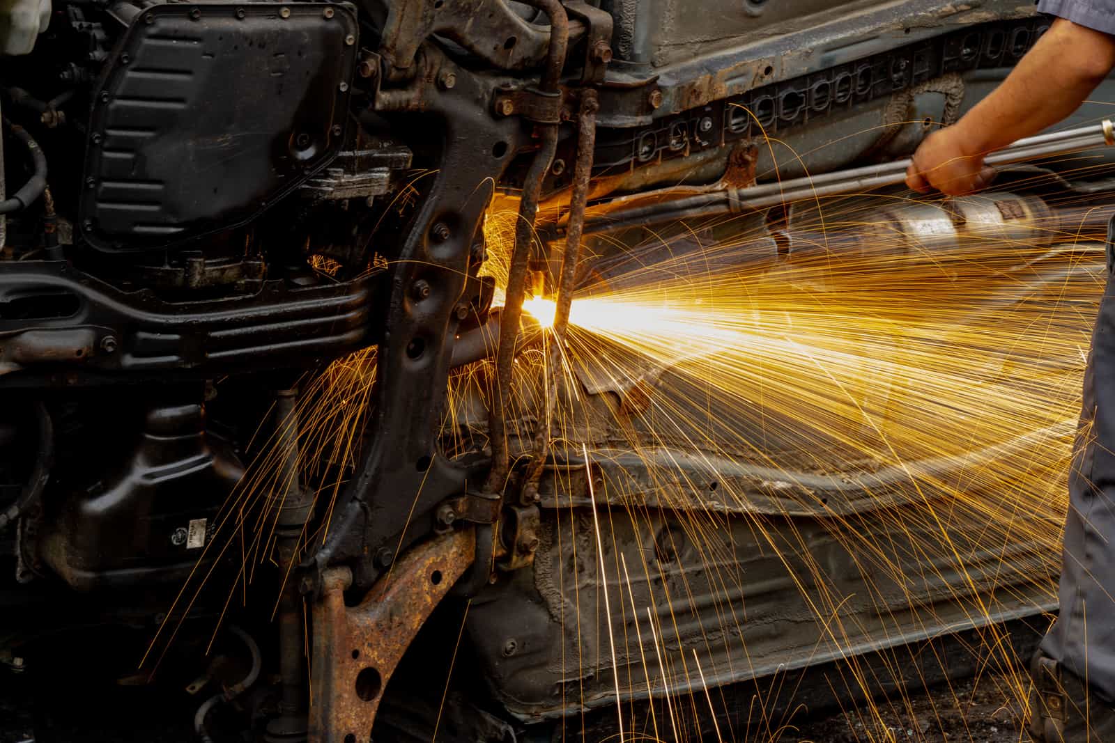 Welding sparks during a vehicle body repair