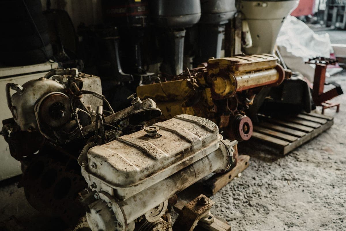 Older engines and components stored in a workshop